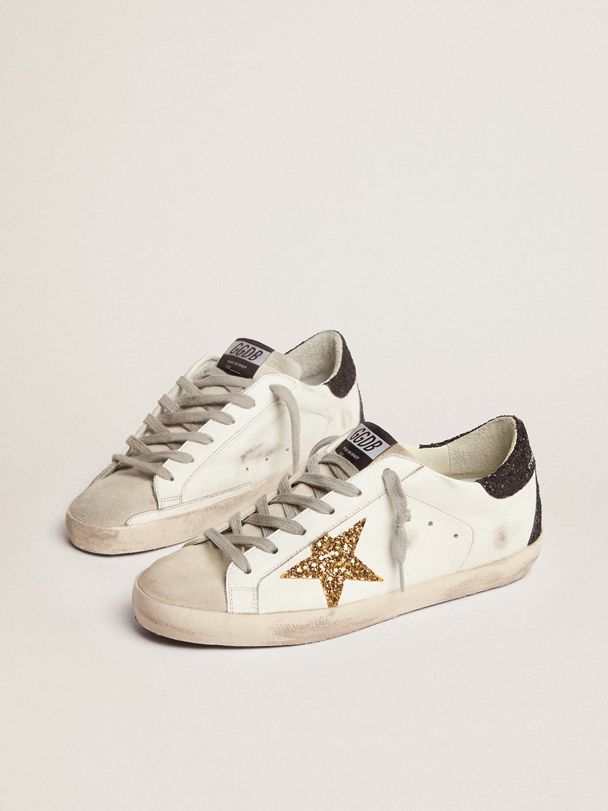 Super-Star Donna in nappa con stella in glitter oro e talloncino in glitter nero